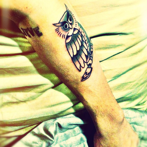 justin bieber owl tattoo