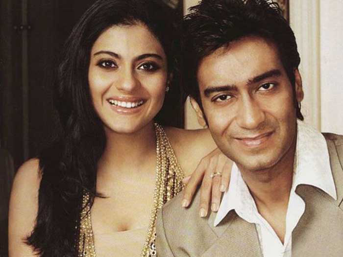 kajol and ajay devgn pose for a picture