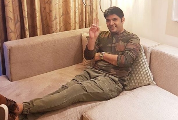 kapil sharma poses for a photo shoot