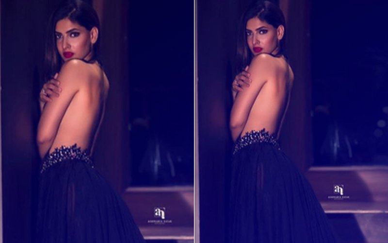 Karishma Sharma Bares Her Sexy Back For A Photo Shoot