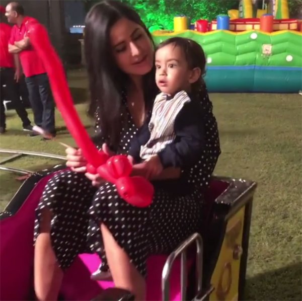 katrina kaif and ahil on a mini toy train