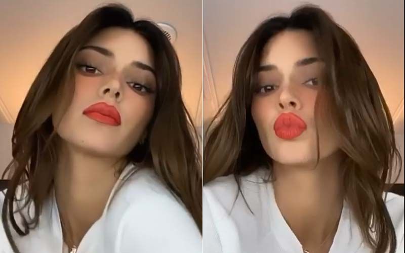 Kendall Jenner Does It Again; Blows Good Night Kisses From Big Red Kylie-Like Lips