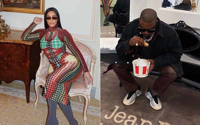 Kanye West Chomping Down On A KFC Burger As Kim Kardashian Tries On The Tightest Maxi Known To Mankind – Photos