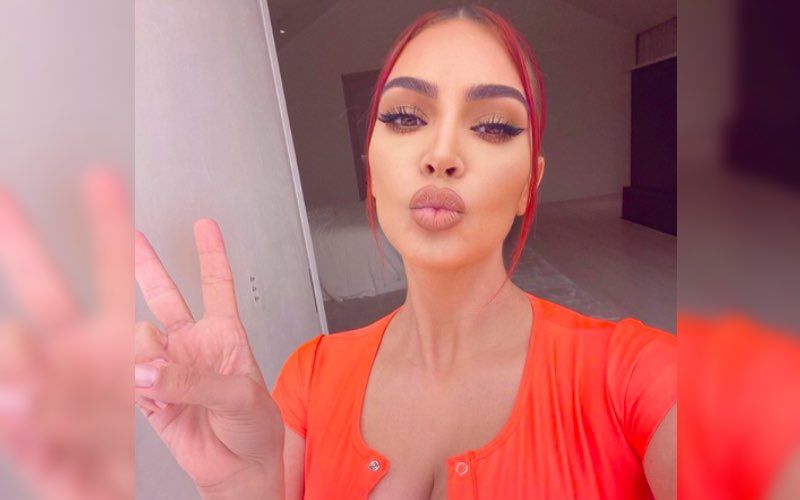 Kim Kardashian Leaves Little To Imagination As She Oozes Hotness In A Sexy See-Through Orange Top – See Pic