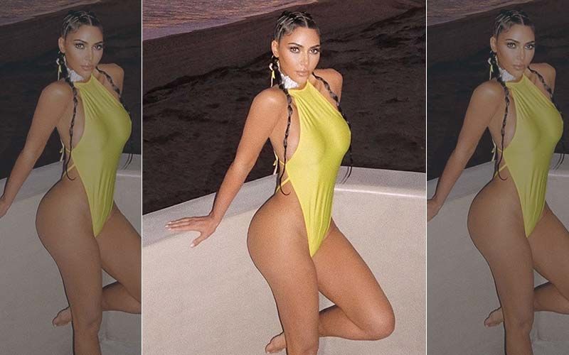 Kim Kardashian Shows Off Curves In Pink Bodysuit