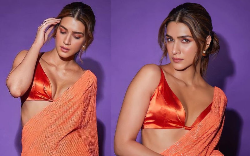 Kriti Sanon Gets Trolled For Donning An Orange Sequin Saree With A Deep-Neckline Blouse; Netizens Say, ‘Bollywood Just Ruined Our Saree Culture’- Pics Inside