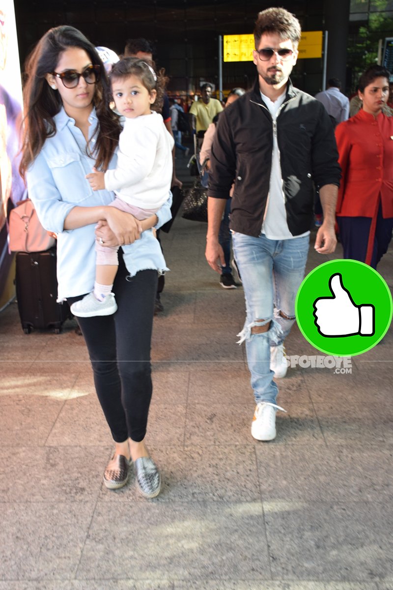 mira rajput with shahid kapoor and baby misha at the airport