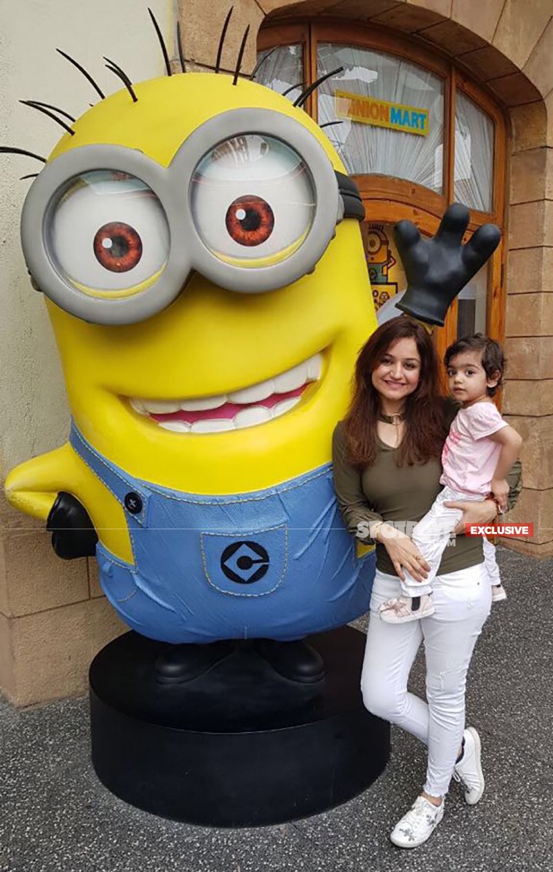 muskaan poses beside a minion with daughter mannat
