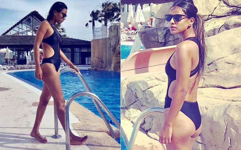 Nia Sharma Flaunts Her Curves In A Bikini As She Poses By The Pool