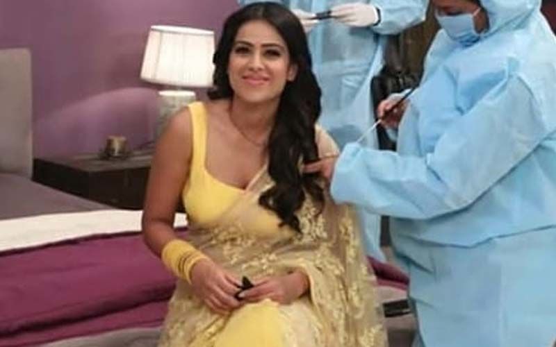 Naagin 4: Nia Sharma Looks Like A Beautiful Belle In Yellow Saree As She Resumes Shoot; Poses With Team Dressed In PPE Kits