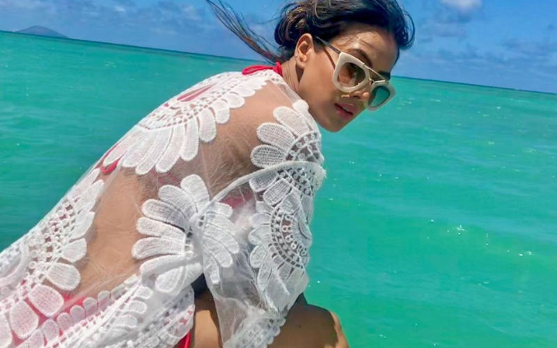 OH-SO-HOT! Nia Sharma Wears Sexy BIKINI With Transparent Cape Outfit Flaunting Her Toned Body As She Chills In Oceans-See PIC