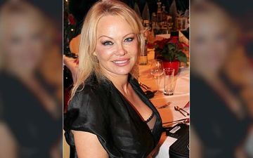 Pamela Anderson Recreates Her Iconic Baywatch Sexy Slow-Mo Beach Run In A Black Wetsuit – PICS