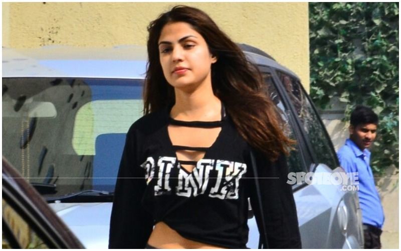 Rhea Chakraborty Dons An Oversized Hoodie That Says ‘Man Up’; Actress Spotted With Her Brother Showik And Father At Mumbai Airport