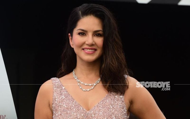 Sunny Leone Jumps With Joy On Her Hotel Bed Wearing A Bathrobe As She Reveals ‘It’s My First Night Alone In 5 Months’- VIDEO