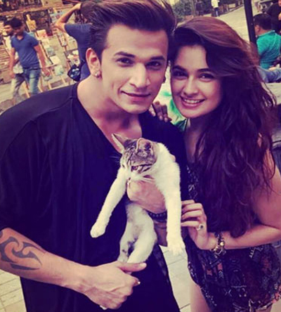 prince and yuvika with a cat