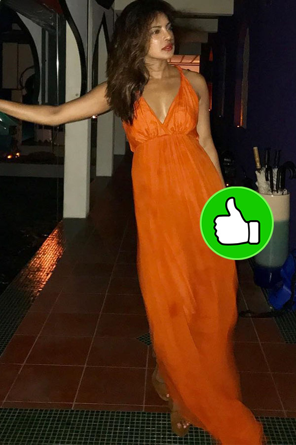 priyanka chopra looks stunning in an orange dress