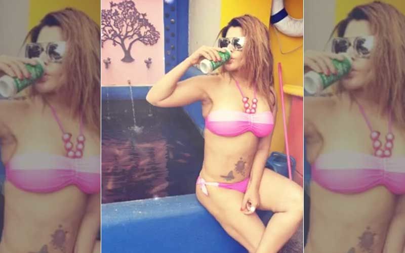 Rakhi Sawant Chills By Pool In A Pink Bikini; Tells Fans, ‘Mera Chill Karne Ka Tarika Apnaye’