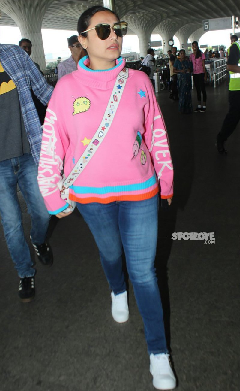rani mukerji in a pink outfit at the airport