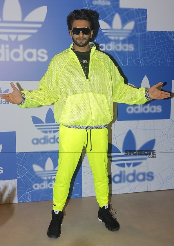 ranveer singh promotes adidas on the rooftop of a car