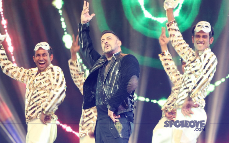 salman khan performing on stage at an award show