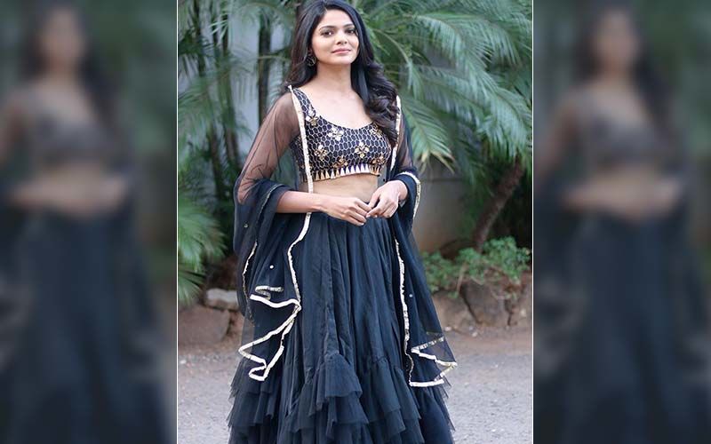 Fashionista Pooja Sawant Turns On The Bling In This Shimerring Golden And Black Lehenga