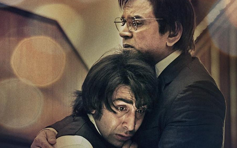 sanju poster featuring ranbir kapoor and paresh rawal