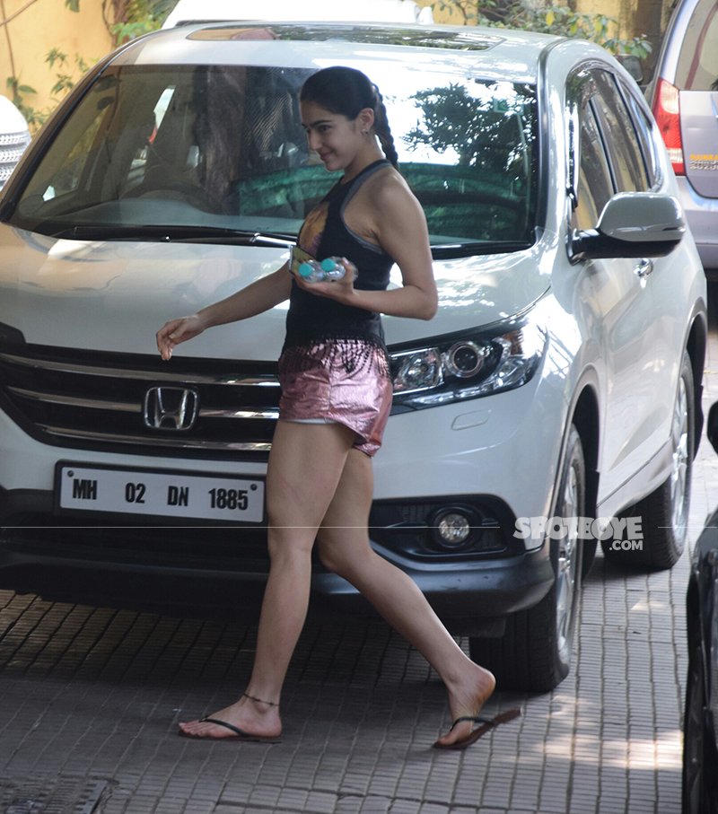 sara ali khan snapped in metallic shorts on her way to the gym