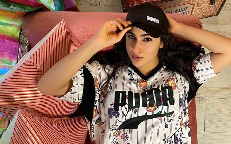 Sara Ali Khan Gives Fans A Virtual Peek Inside Her House; Looks Stunning With Purple Lipstick And A Black Cap