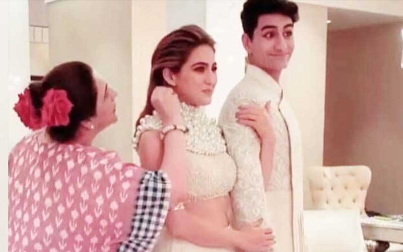 Check out Sara Ali Khan and Ibrahim’s Goofy Expressions As Mom Amrita Singh Puts Kala Teeka On The Actress In This BTS Picture