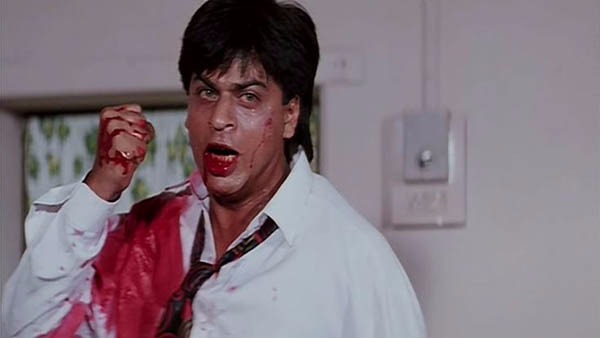 shah rukh khan in a still from baazigar