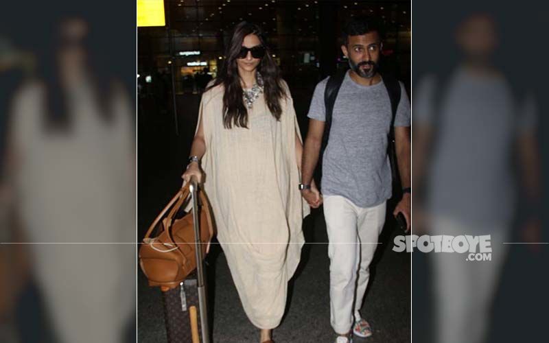 Sonam Kapoor-Anand Ahuja Return A Happy Bunch From Maldives, Get Papped At The Airport