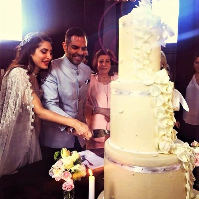 sunjay kapoor cutting a cake in new york