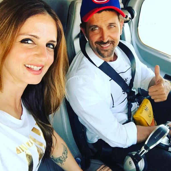 sussanne khan and hrithik roshan pose for a selfie