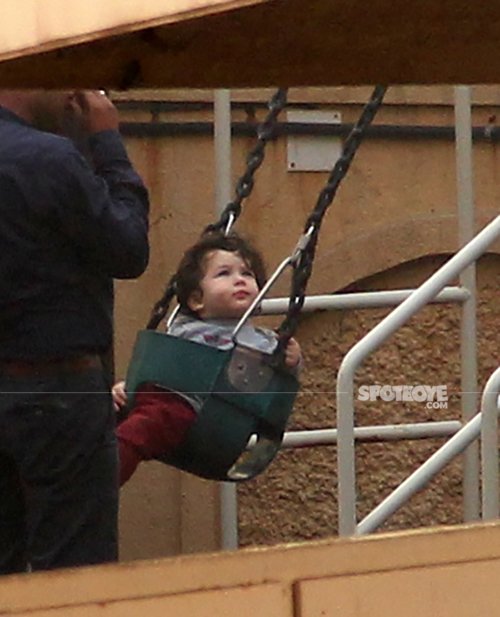 taimur ali khan is all smiles as he rides on the swing