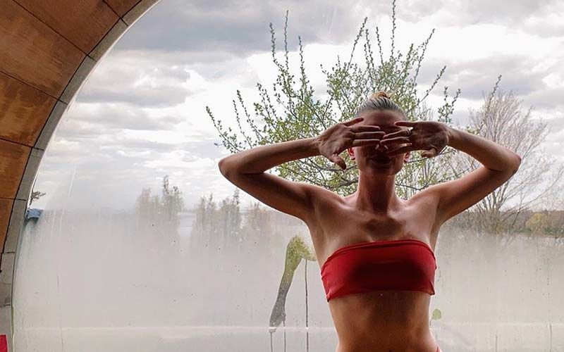 Hailey Baldwin Bieber Enjoys A Sauna Session; Posts A Flaming Hot Bikini Pic Dripping In ‘Quarantine Sweat’