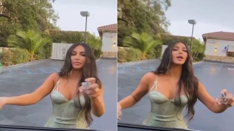 Kim Kardashian Shows Off As She Tries On Her Latest Diamond Perfume; Sprays Some On Her Face And Eyes- Watch Video