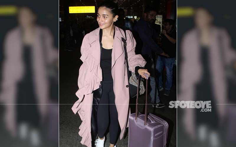 Alia Bhatt Makes A Fashion Statement In A Pink Overcoat As She Returns From Her Los Angeles Vacation