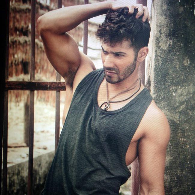 varun dhawan posing for a photoshoot