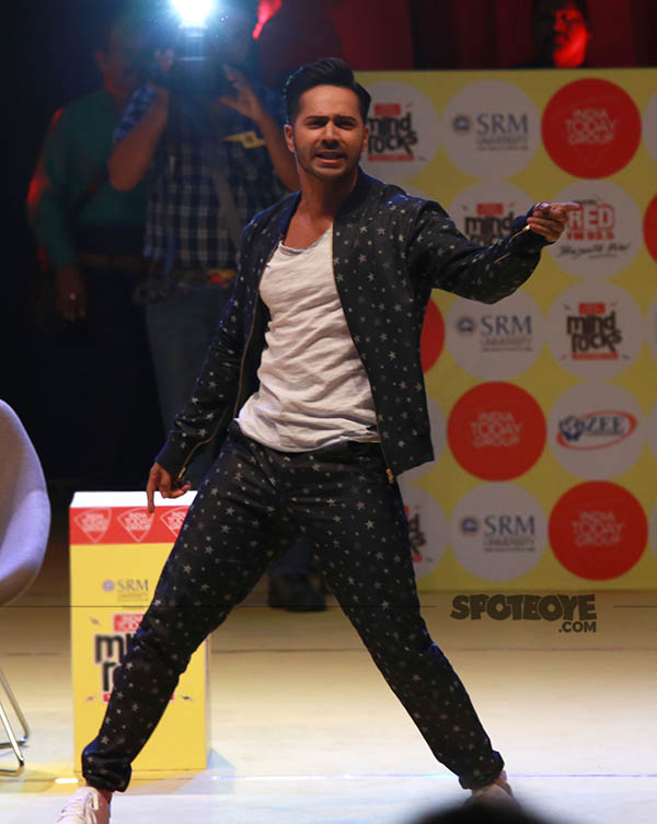 varun dhawan strikes a dancing pose