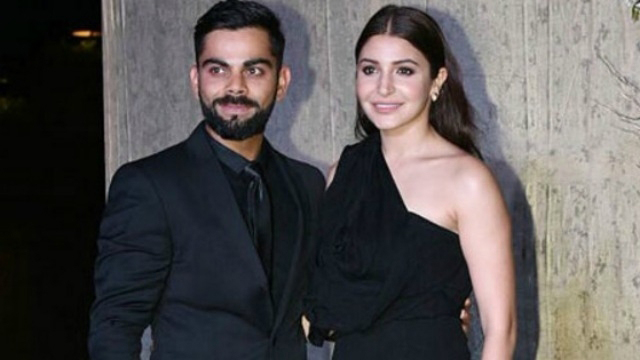 virat kohli and anushka sharma pose for shutterbugs