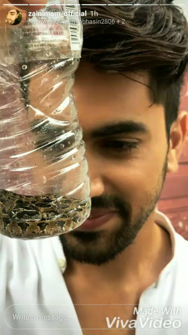 zain iman with the snake in the bottle that entered his make-up room